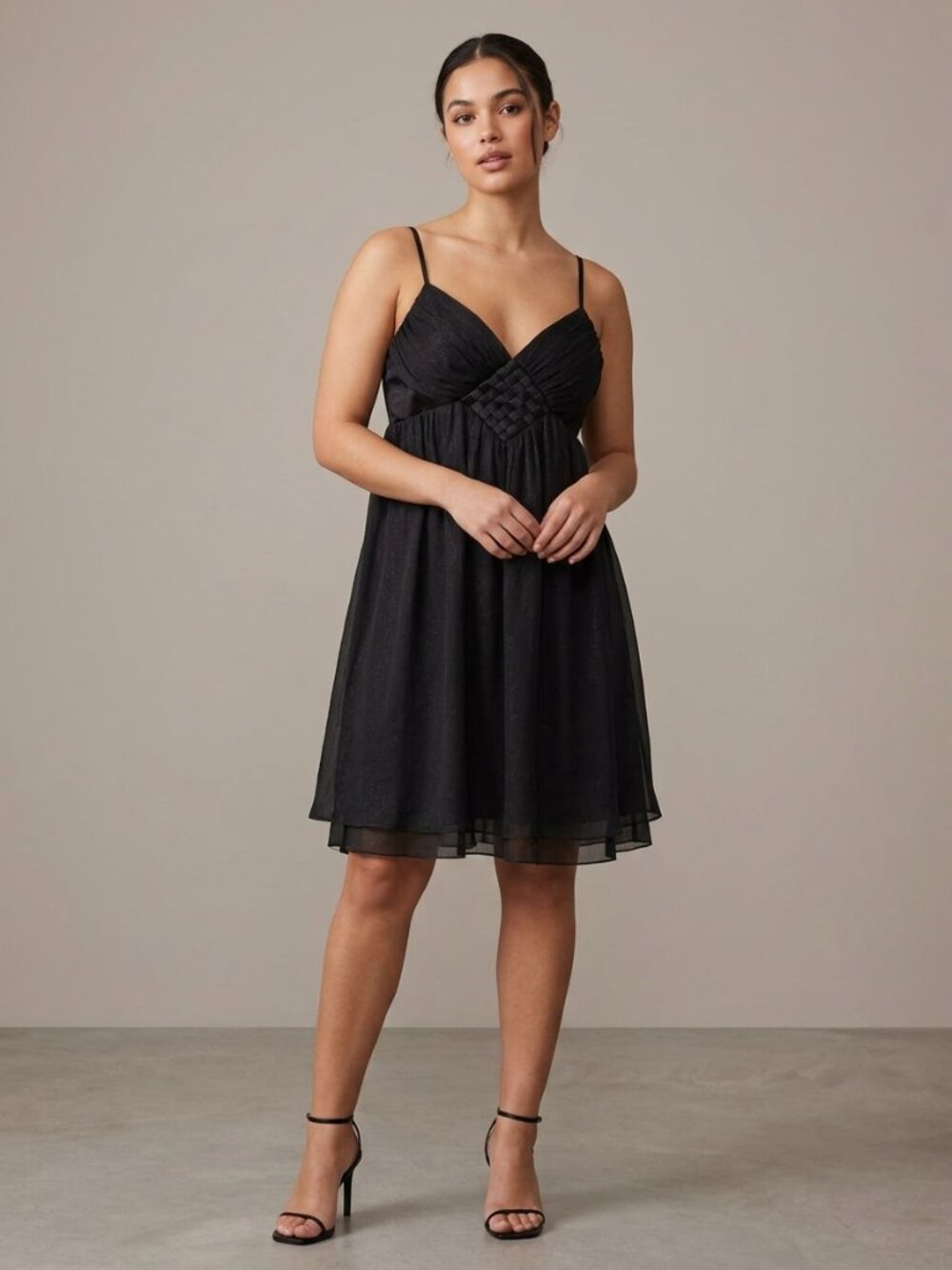 Flowy and Shimmery Black Cocktail Dress with a Basket Weave Detail